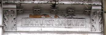 Photo of th estone carved lettering of Bathurst Mansions